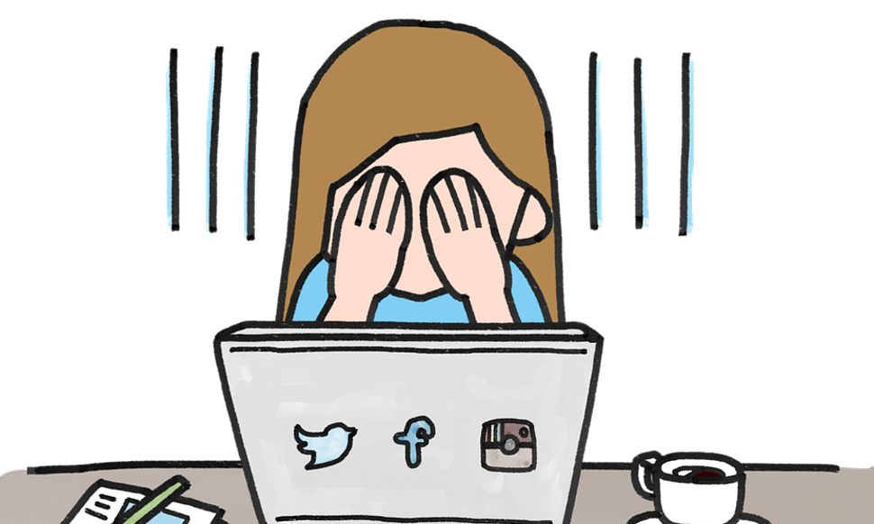 Girl crying over social media on laptop